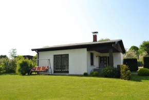 Ferienhaus am See auf großem Grundstück, Kaminofen
